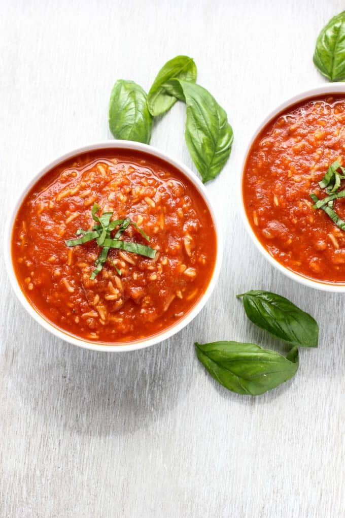 Tomato soup in white bowls