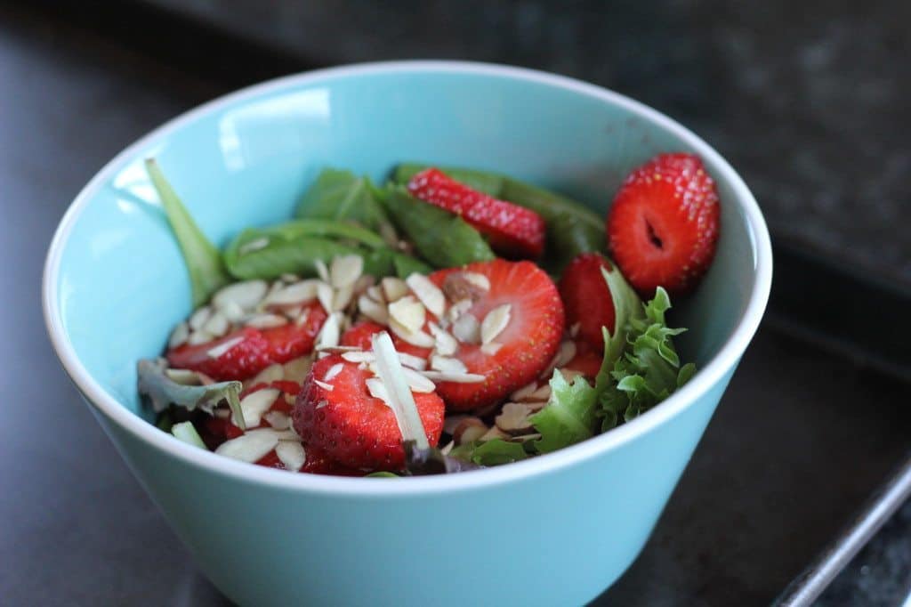 mixed green salad with strawberries