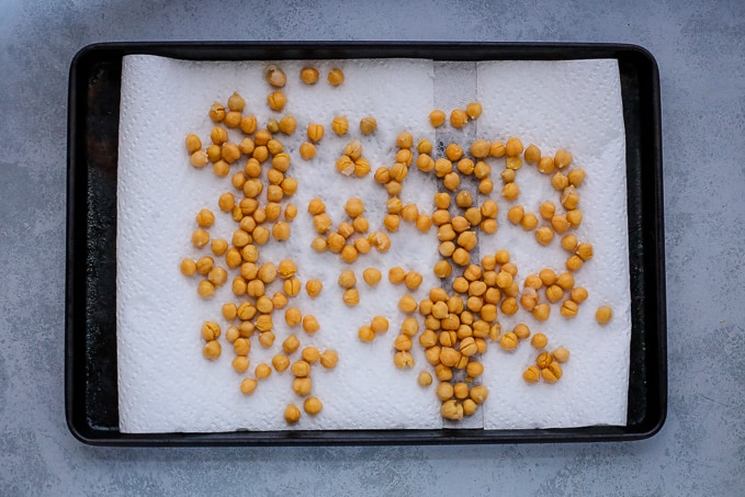 chickpeas drying on a paper towel