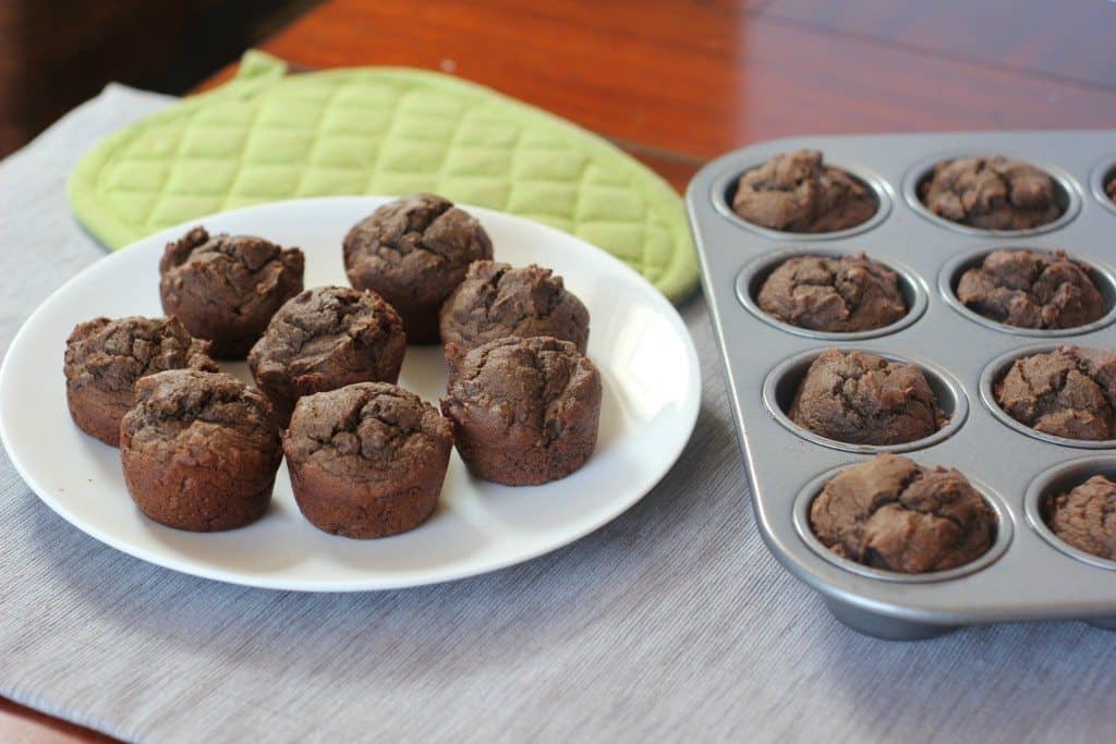 What's the secret to these healthy, whole wheat chocolate muffins? AVOCADO! The healthy fat makes these muffins irresistibly moist but still healthy enough for breakfast!