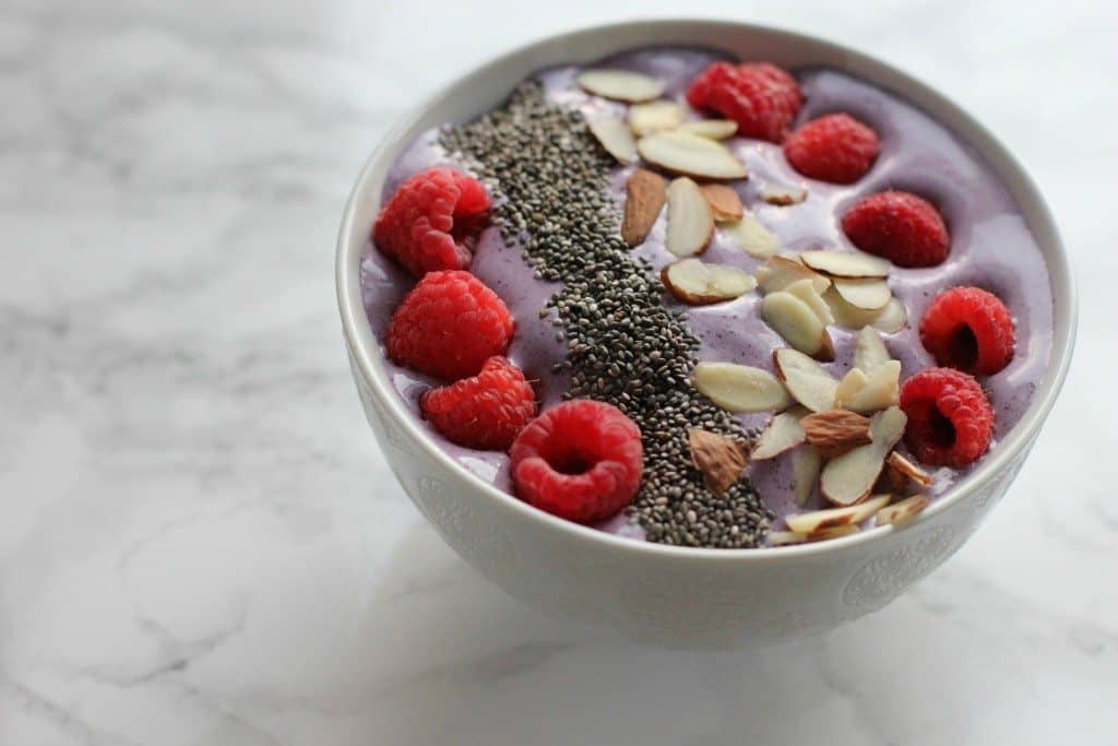 blueberry smoothie bowl with toppings