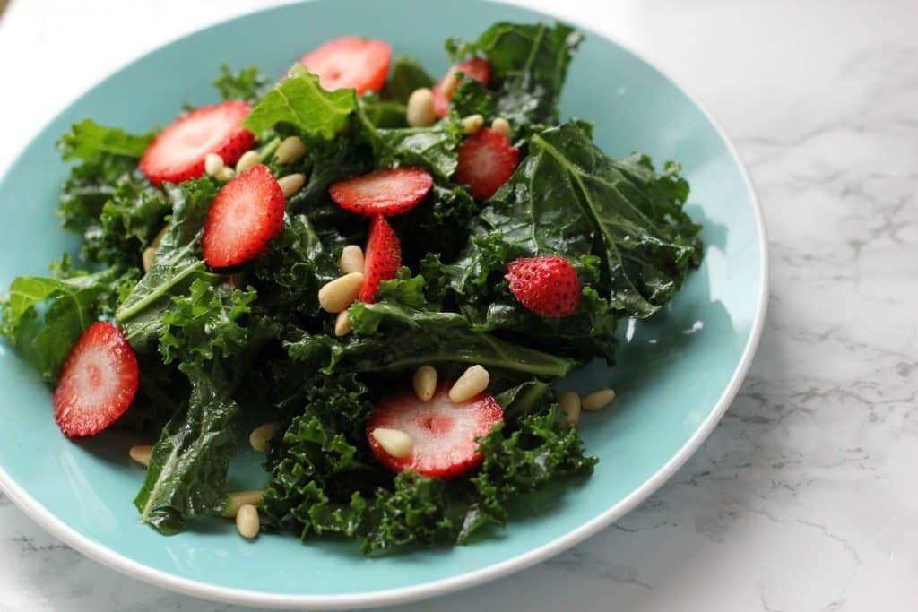 kale salad and strawberries