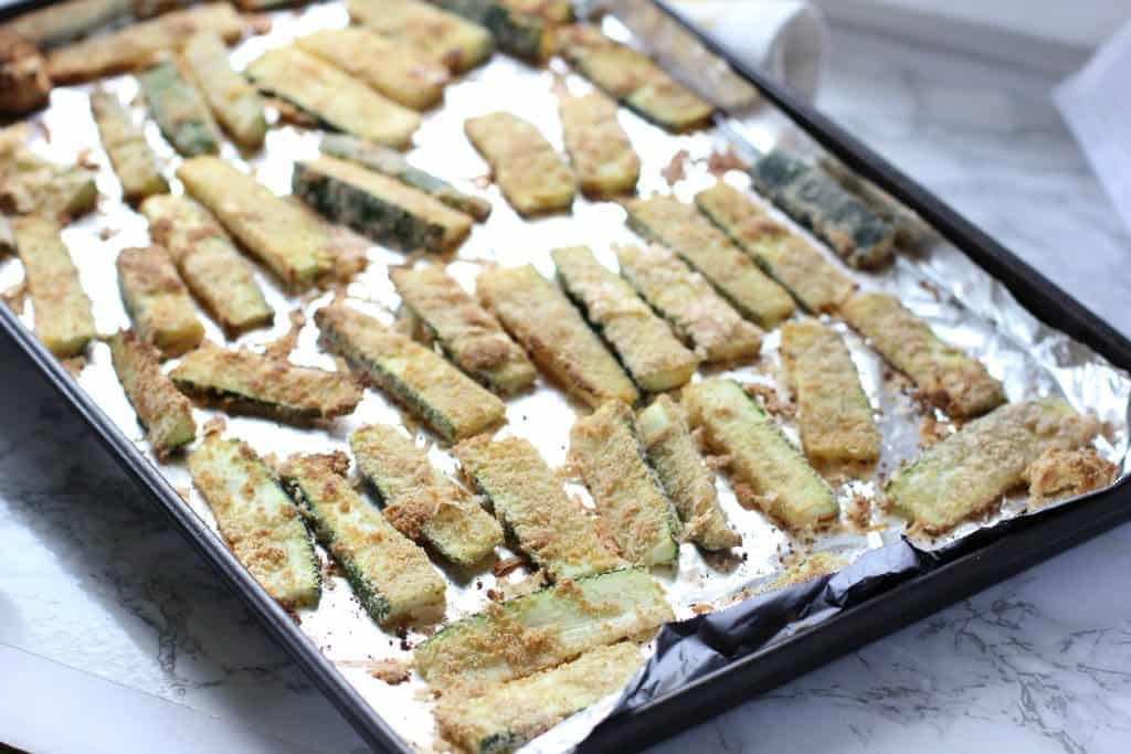 A tray of food, with Zucchini 