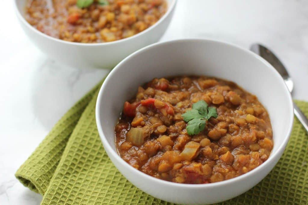 This curried lentil soup is a budget friendly dinner recipe that is also vegan and gluten free!