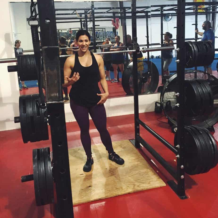 woman in a gym with weights