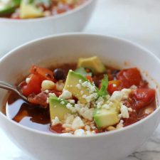This vegetarian taco soup recipe is the perfect weeknight meal! It's a one pot recipe that'll help you get dinner on the table in minutes!