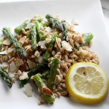 A plate of food with broccoli, with Salad and Asparagus