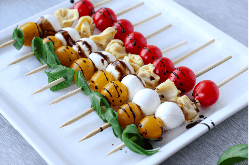 antipasto skewers on a plate