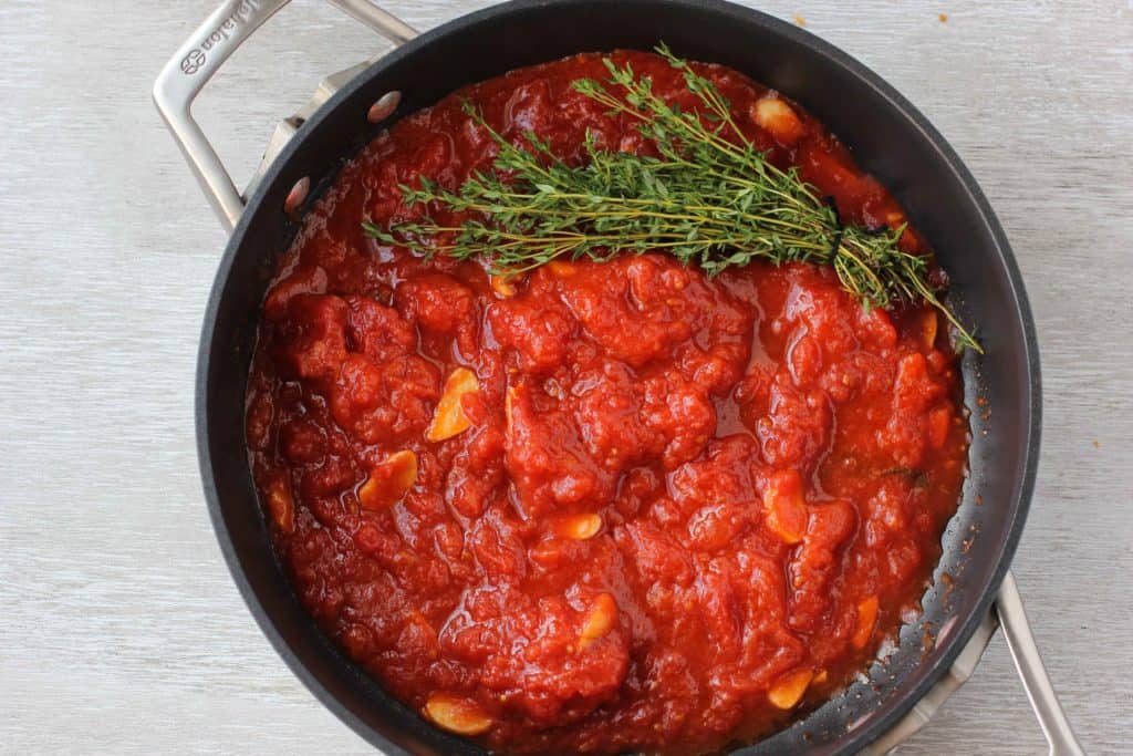 pomodoro sauce in a pan with thyme