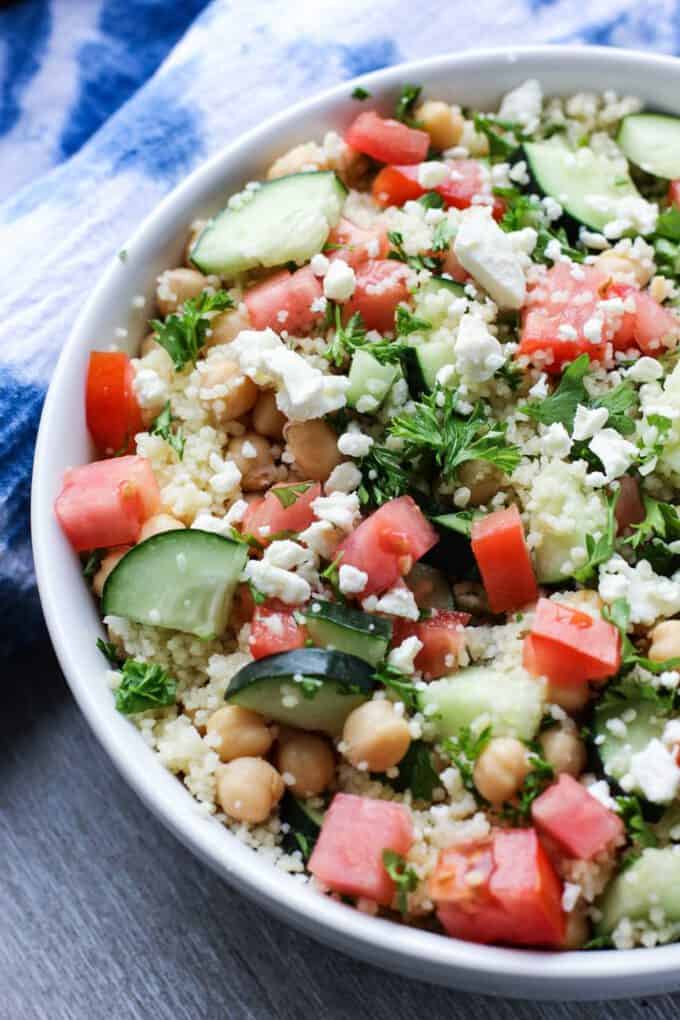 couscous salad in a white bowl