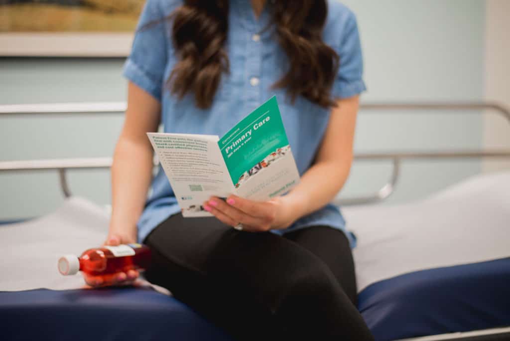 A girl sitting on a table