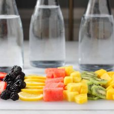 glasses of water with fruit