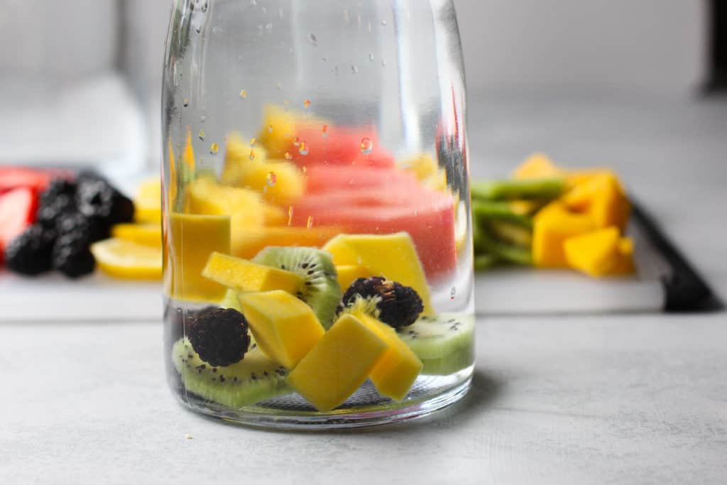 A jar of water with fruit