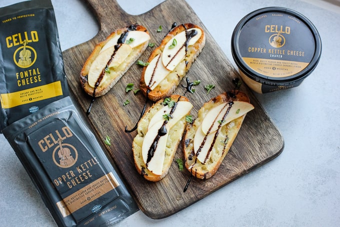 bread and cheese on a cutting board