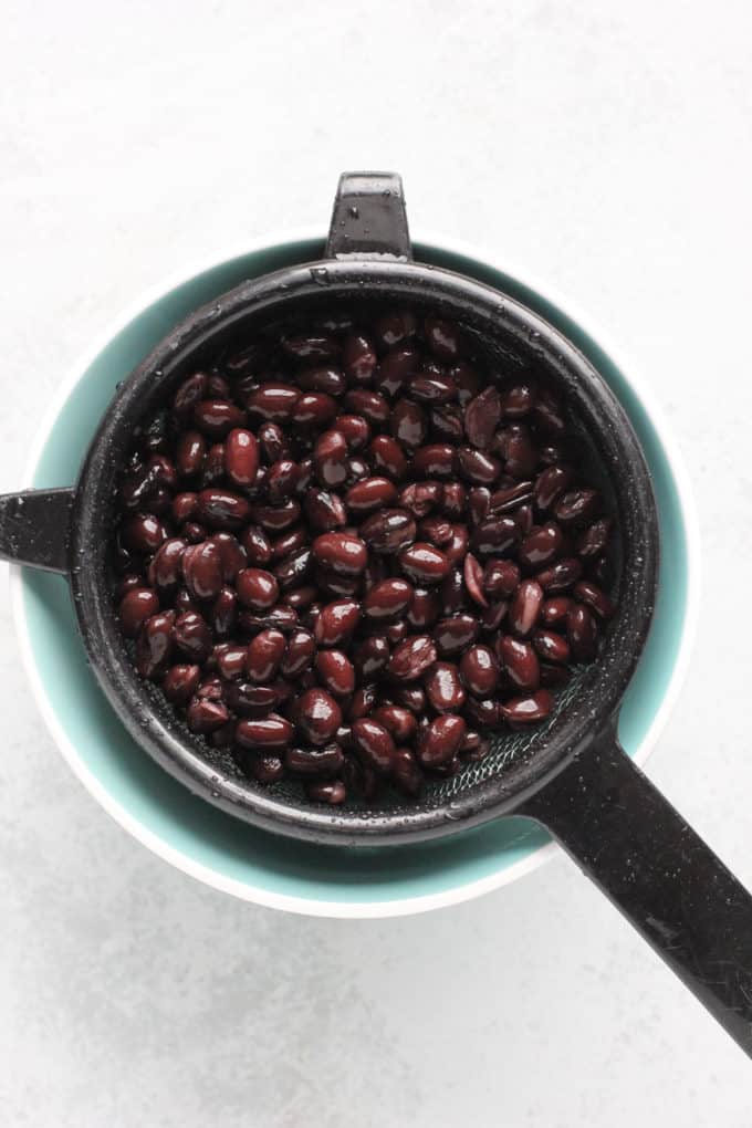 beans in a strainer