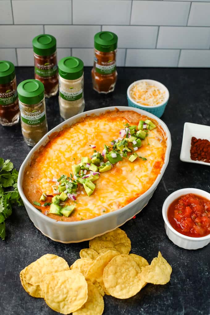 taco dip in a dish with spices