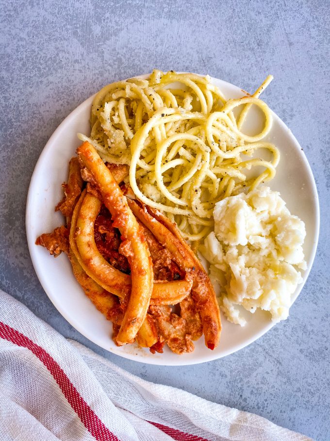 A plate of food, with Pasta