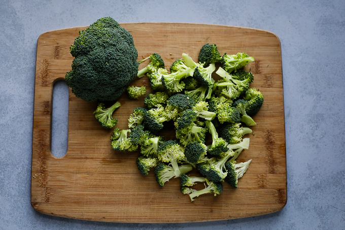 broccoli chopped on a cutting board