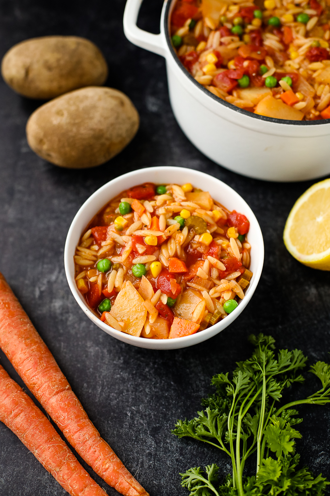 orzo vegetable soup in a bowl