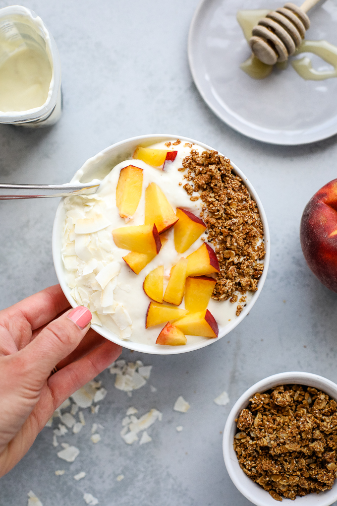 peach yogurt bowl with granola