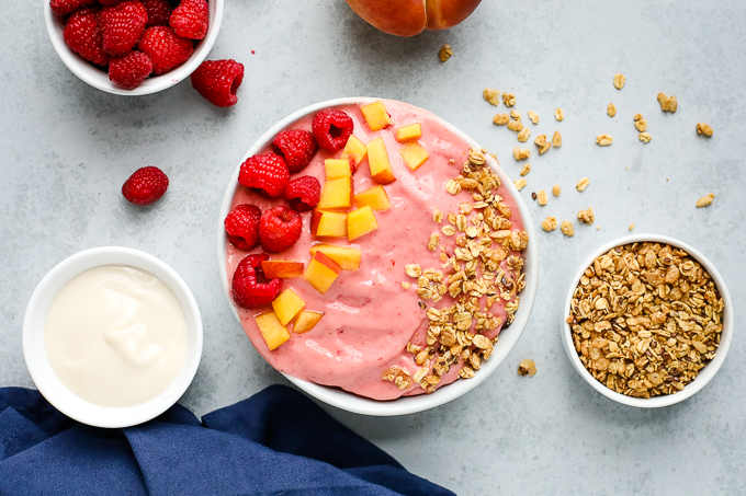 peach raspberry smoothie bowl