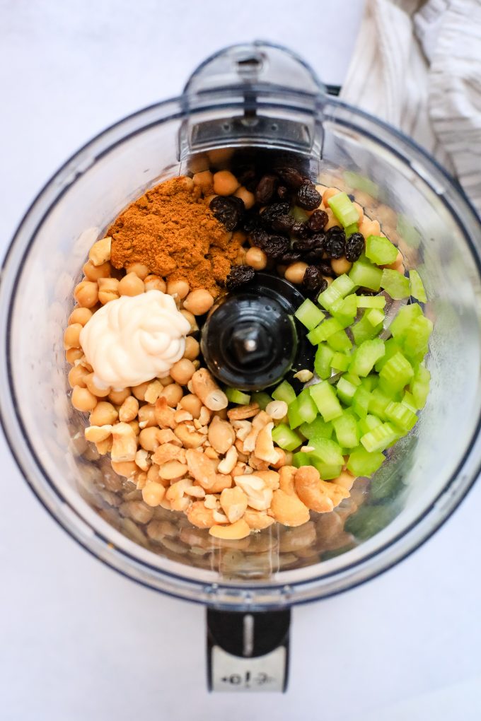 Chickpea salad ingredients in a food processor