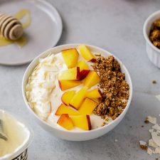 peach yogurt bowl with granola