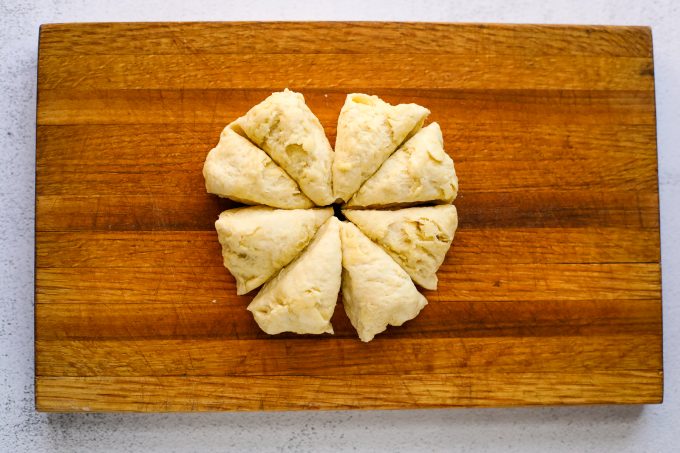 flatbread dough on a cutting board