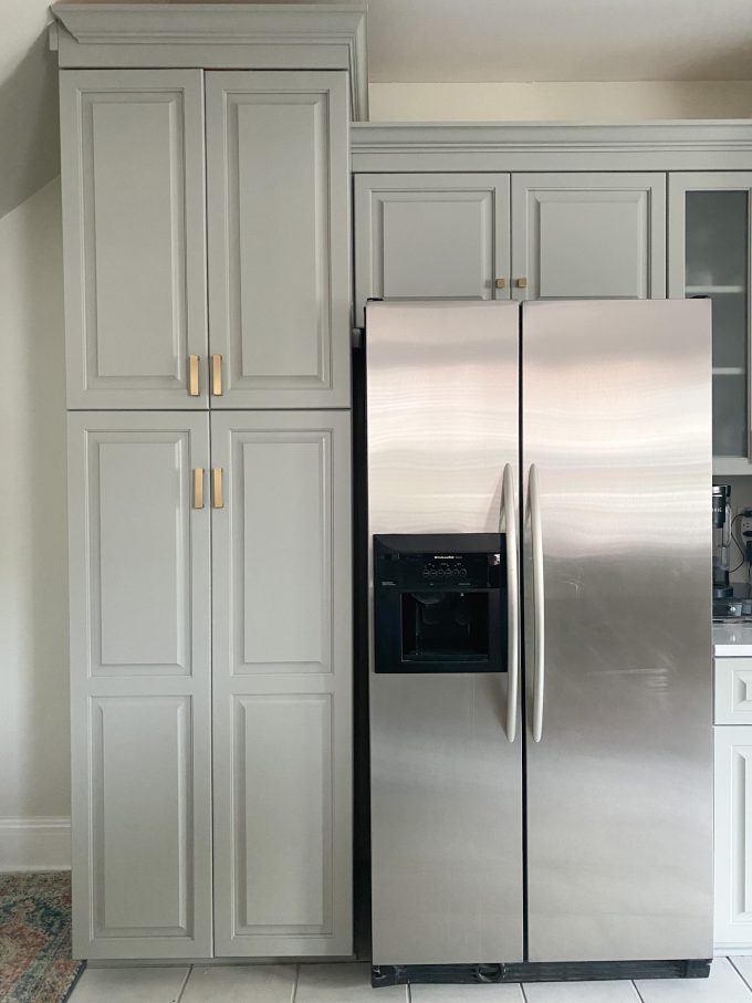 A stainless steel refrigerator in a kitchen