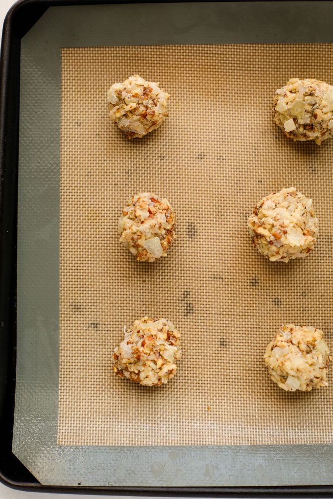 nut meatballs on a baking sheet