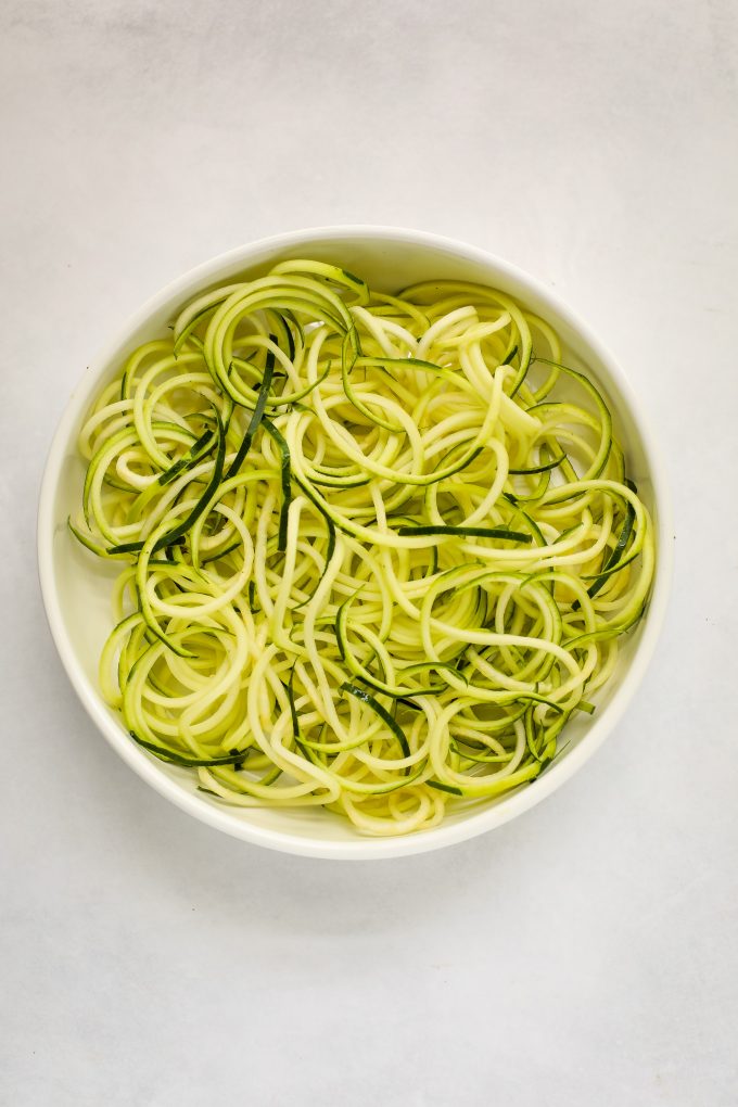 a bowl of zucchini noodles