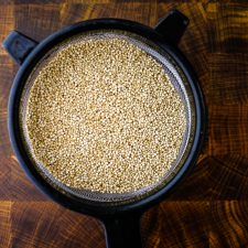 quinoa in a mesh strainer