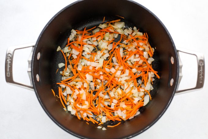 carrots and onions in a pot