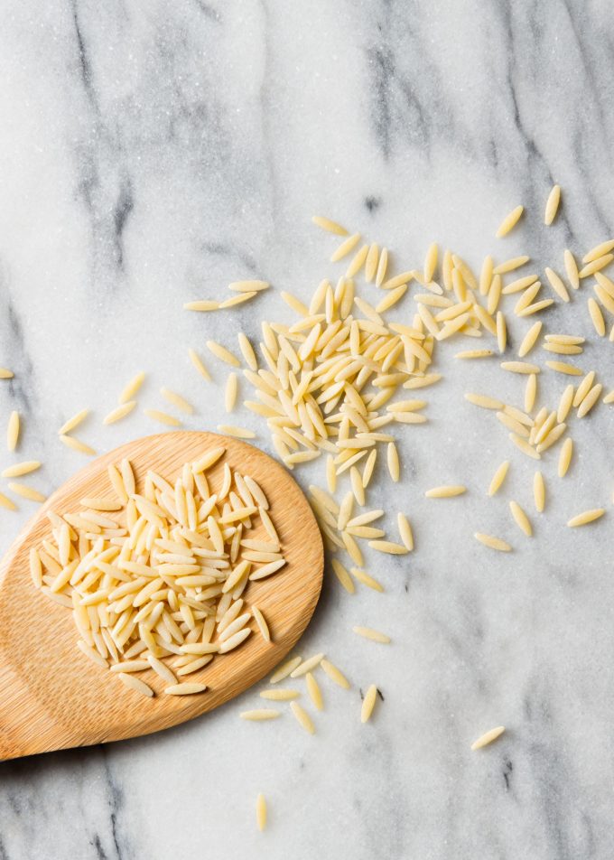 orzo pasta on a marble surface