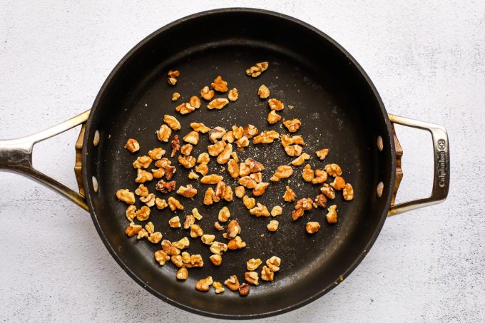 toasted walnuts in a pan