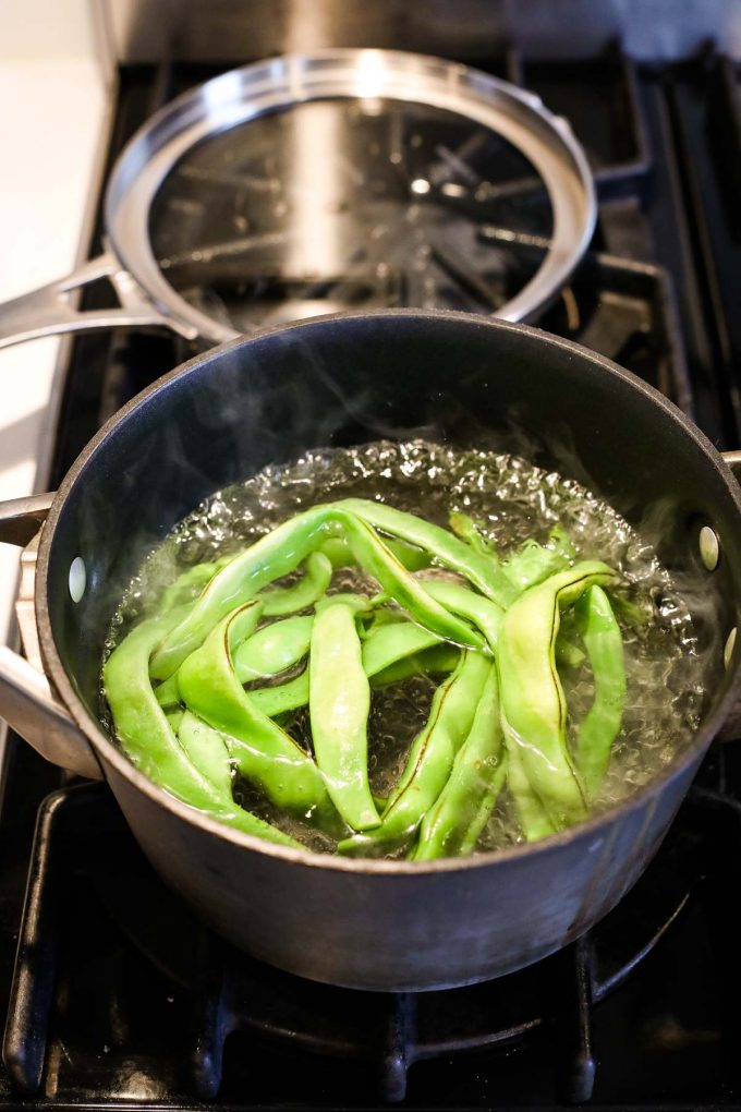 romano beans in a pot of water