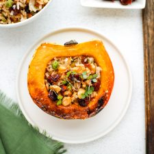 Squash cut in half and stuffed with rice and vegetables