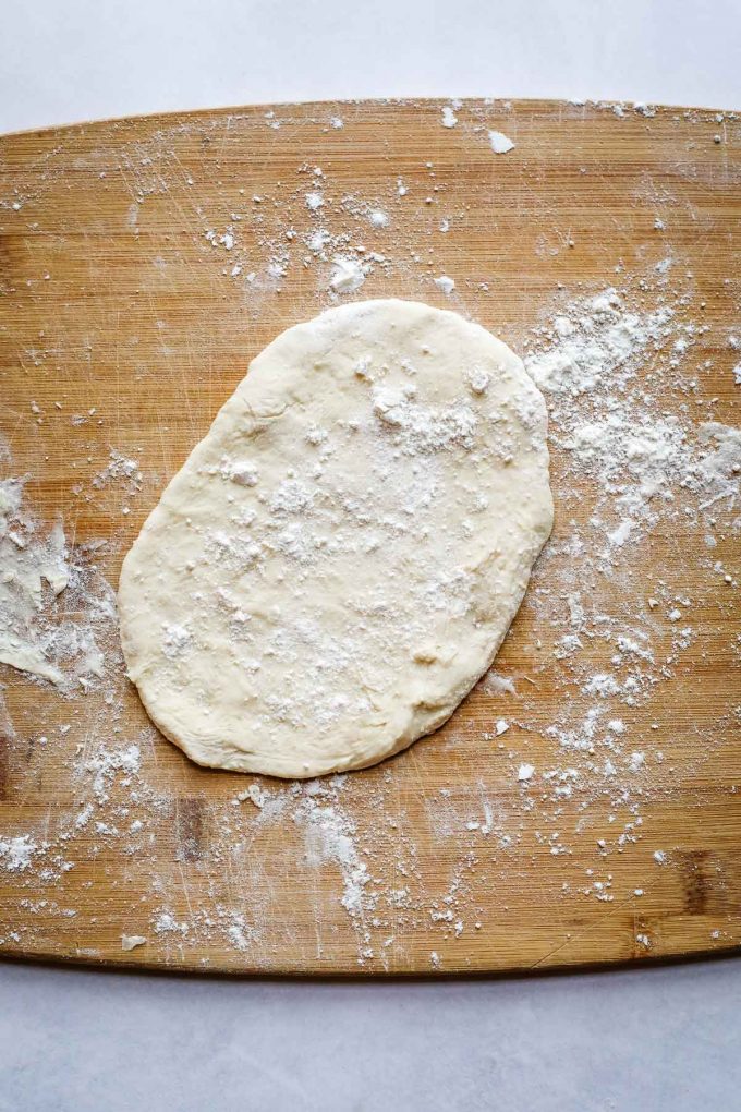 naan dough on a cutting board