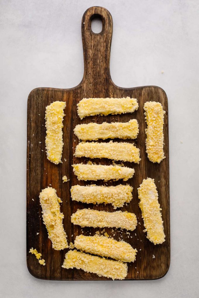 halloumi fries on a cutting board