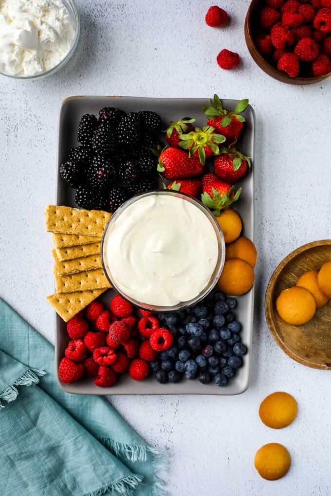 cream cheese fruit dip surrounded by fruit