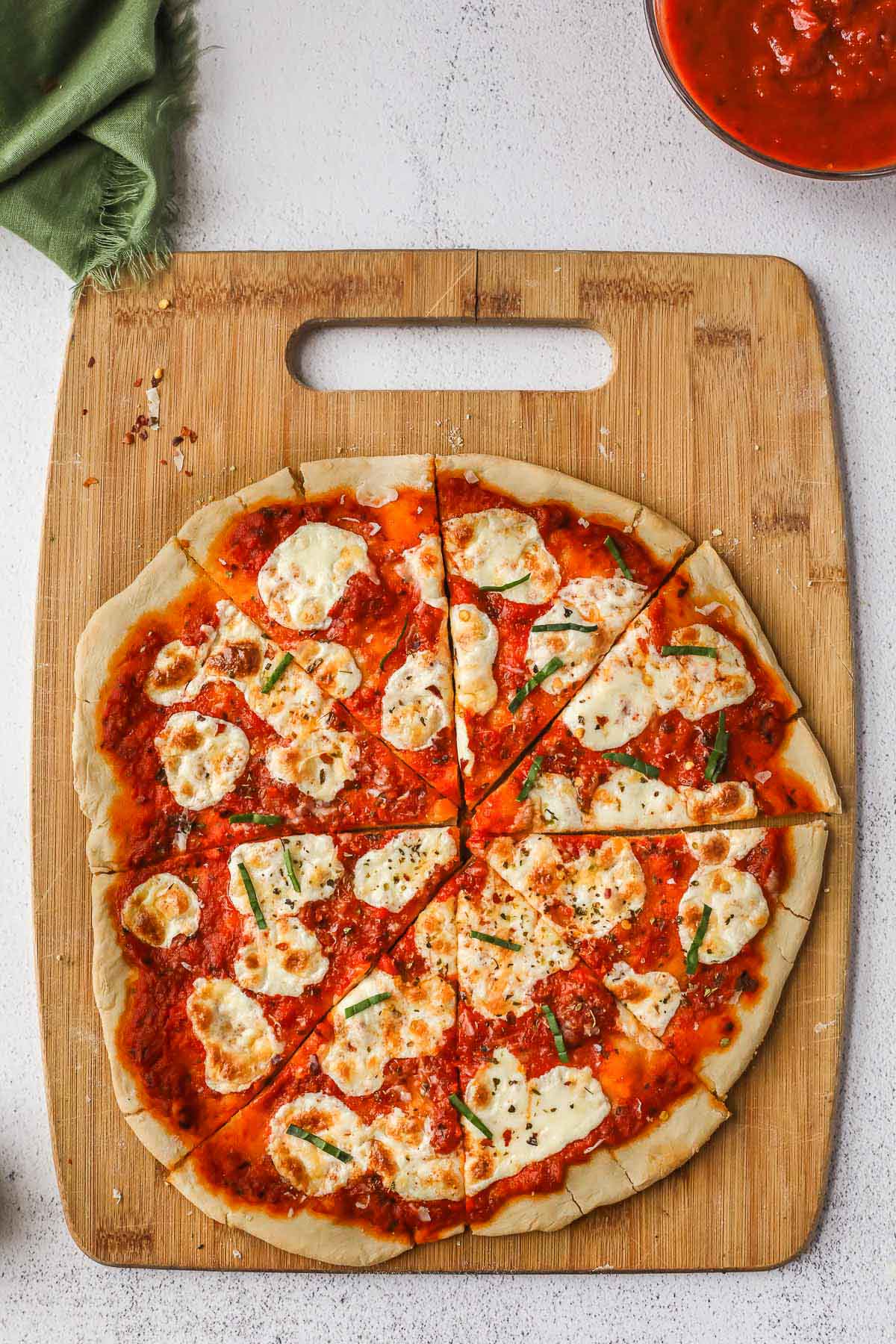 beer pizza on a cutting board