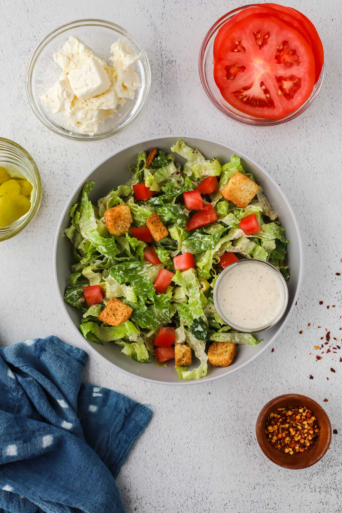salad in a bowl with feta dressing